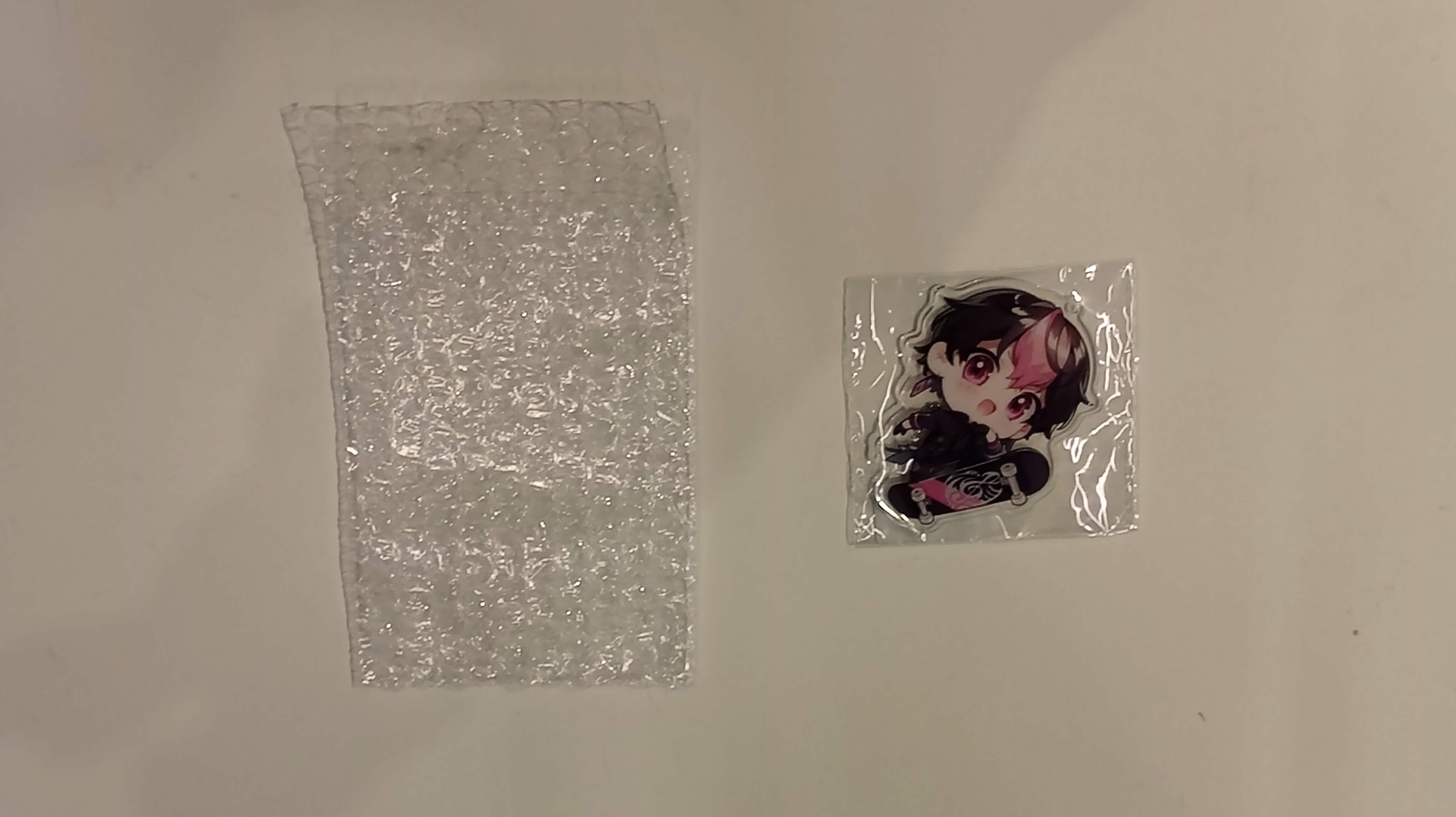 （ナレッジ記事）【ファンに感動を届ける】アクリルキーホルダーの発送・梱包術：チェーン配置に込める品質管理と気遣い